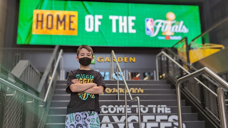 G standing in front of TD Garden