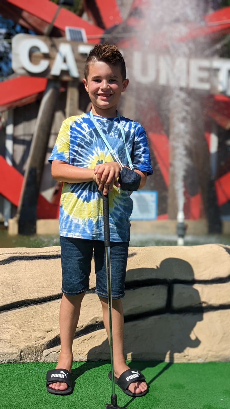 G posing at Cautaumet Mini-Golf